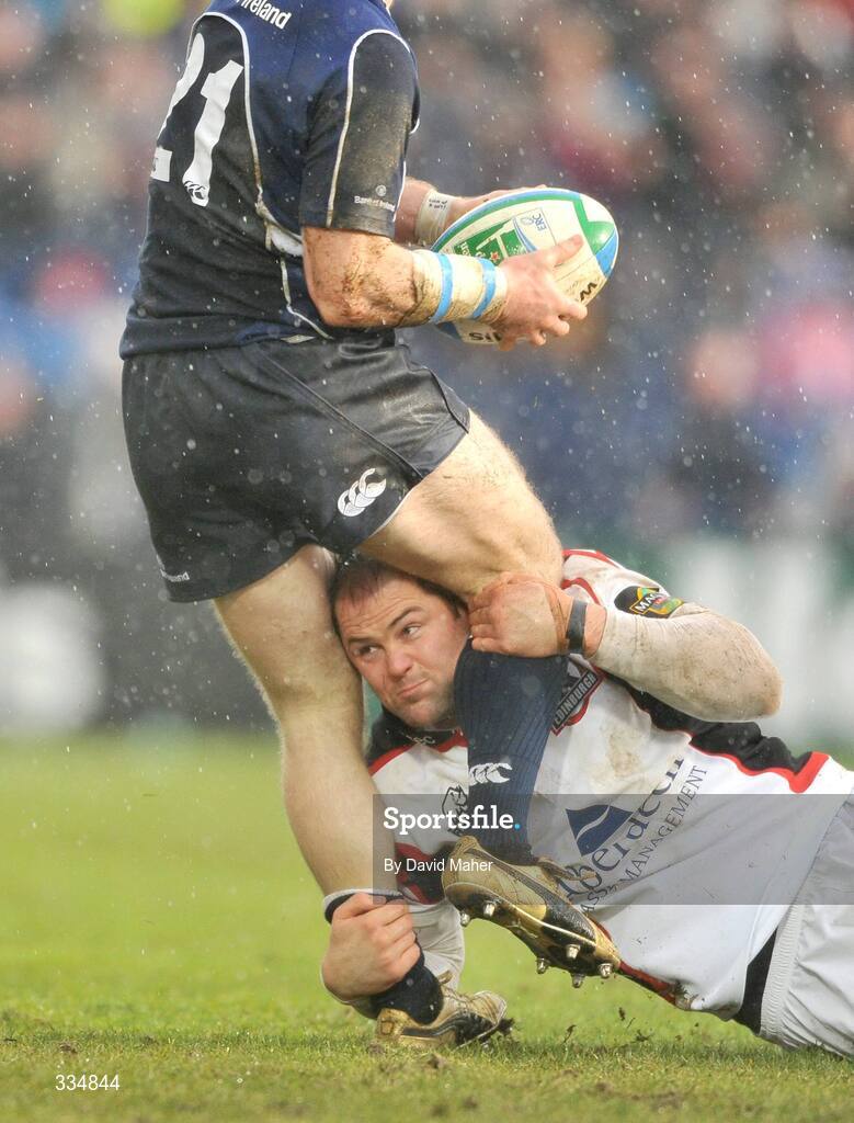 25 January 2009; Geoff Cross, Edinburgh, tackles Gordon D'Arcy, Leinster. Heineken Cup, Pool 2, Round 6, Leinster v Edinburgh, RDS, Dublin. Picture credit: David Maher / SPORTSFILE