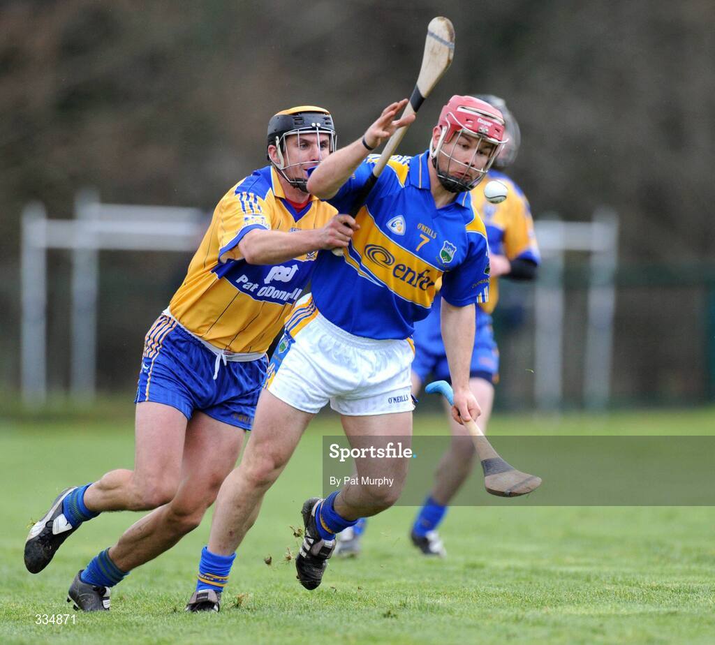 25 January 2009; Diarmaid Fitzgerald, Tipperary, in action against Tony Griffin, Clare. Waterford Crystal Cup Hurling Final, Clare v Tipperary, Ogonnolloe, Co. Clare. Picture credit: Pat Murphy / SPORTSFILE