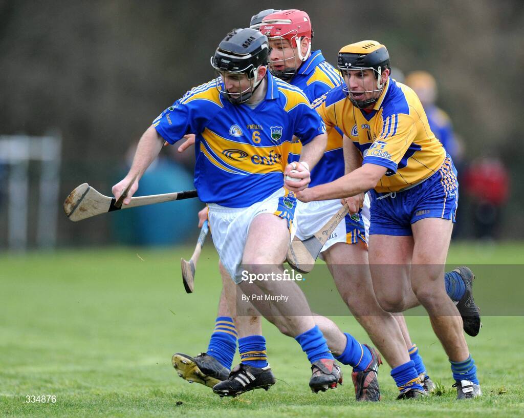 25 January 2009; Conor O'Mahony, Tipperary, in action against Tony Griffin, Clare. Waterford Crystal Cup Hurling Final, Clare v Tipperary, Ogonnolloe, Co. Clare. Picture credit: Pat Murphy / SPORTSFILE