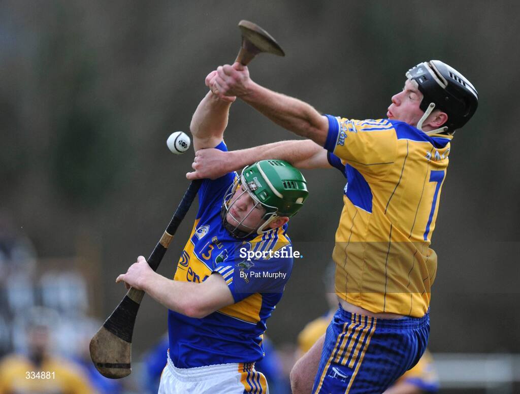 25 January 2009; Noel McGrath, Tipperary, in action against Conor Plunkett, Clare. Waterford Crystal Cup Hurling Final, Clare v Tipperary, Ogonnolloe, Co. Clare. Picture credit: Pat Murphy / SPORTSFILE