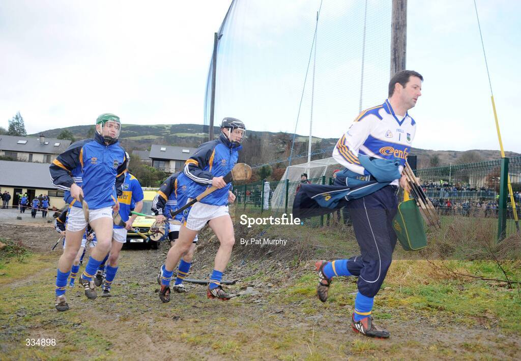 25 January 2009; Tipperary goalkeeper Brendan Cummins and his team-mates make their way onto the pitch. Waterford Crystal Cup Hurling Final, Clare v Tipperary, Ogonnolloe, Co. Clare. Picture credit: Pat Murphy / SPORTSFILE