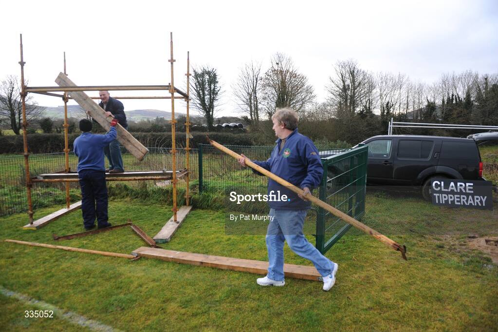 25 January 2009; Groundsmen Pat Rice, left, Brian O'Neill, right, and Michael Bryan, top, construct the scoreboard before the game. Waterford Crystal Cup Hurling Final, Clare v Tipperary, Ogonnolloe, Co. Clare. Picture credit: Pat Murphy / SPORTSFILE