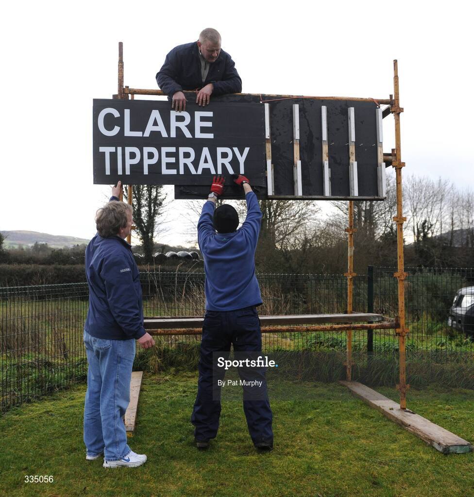 25 January 2009; Groundsmen Pat Rice, right, Brian O'Neill, left, and Michael Bryan construct the scoreboard before the game. Waterford Crystal Cup Hurling Final, Clare v Tipperary, Ogonnolloe, Co. Clare. Picture credit: Pat Murphy / SPORTSFILE