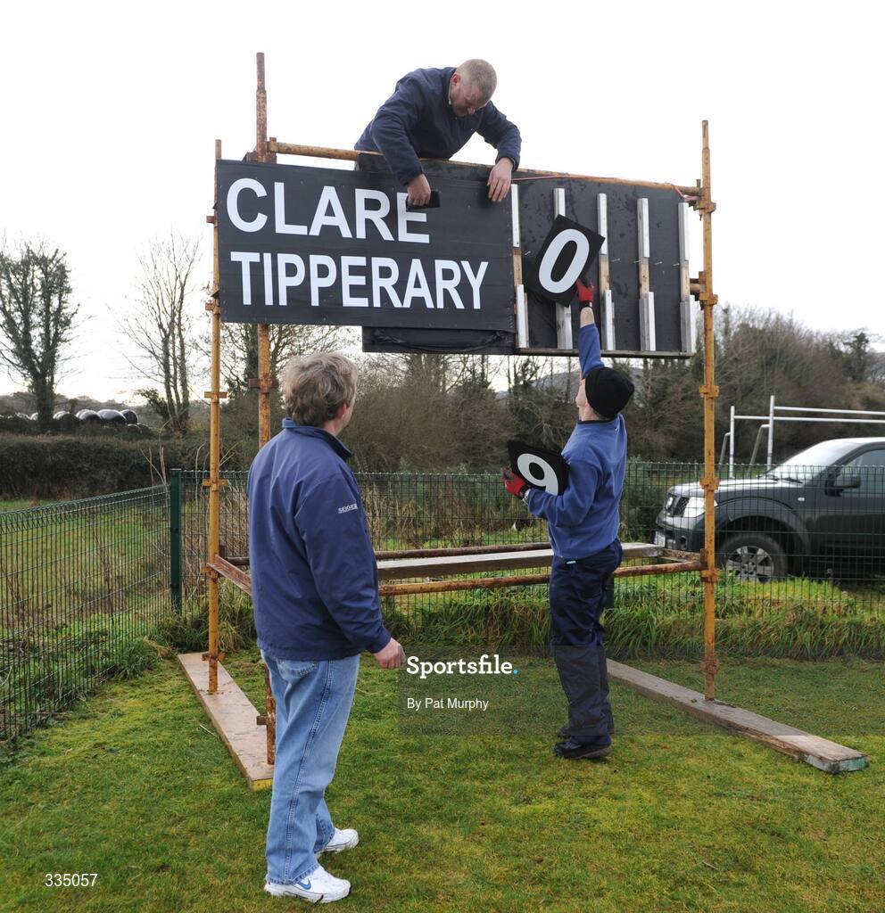 25 January 2009; Groundsmen Pat Rice, right, Brian O'Neill, left, and Michael Bryan construct the scoreboard before the game. Waterford Crystal Cup Hurling Final, Clare v Tipperary, Ogonnolloe, Co. Clare. Picture credit: Pat Murphy / SPORTSFILE