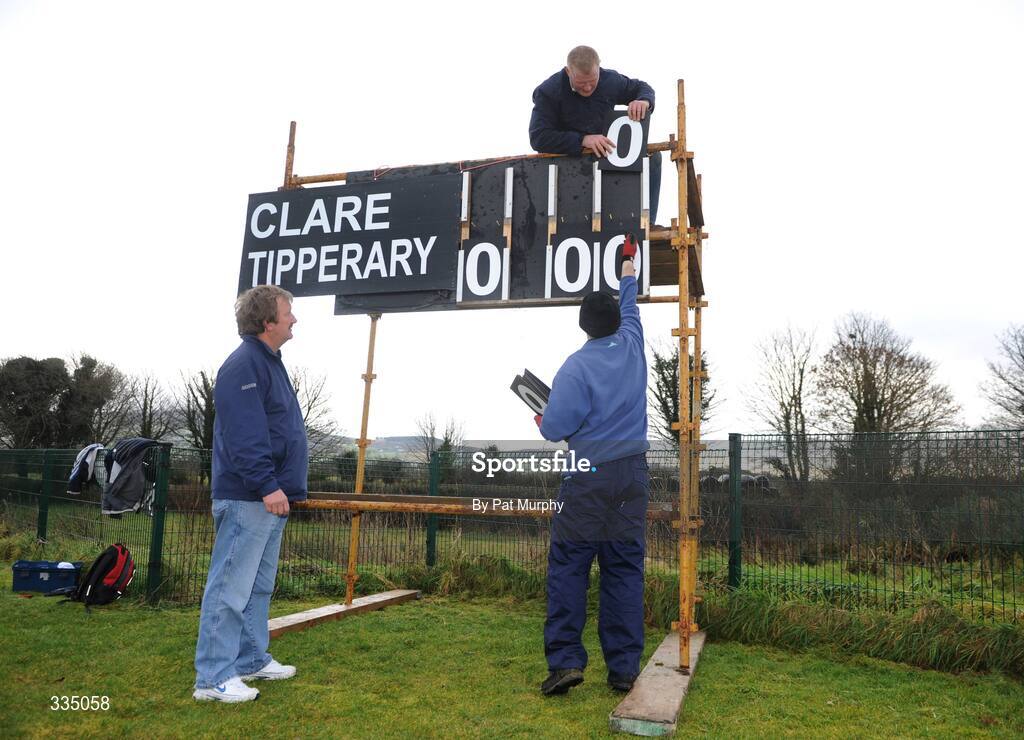 25 January 2009; Groundsmen Pat Rice, right, Brian O'Neill, left, and Michael Bryan construct the scoreboard before the game. Waterford Crystal Cup Hurling Final, Clare v Tipperary, Ogonnolloe, Co. Clare. Picture credit: Pat Murphy / SPORTSFILE