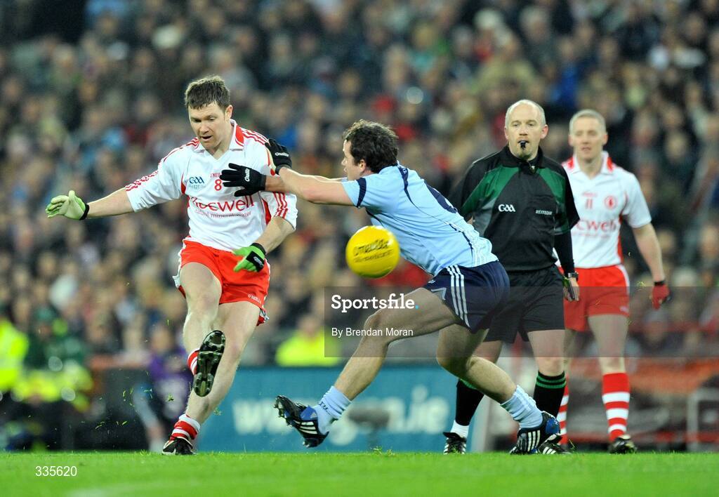 31 January 2009; Enda McGinley, Tyrone, in action against Ger Brennan, Dublin. Allianz National Football League, Division 1, Round 1, Dublin v Tyrone, Croke Park, Dublin. Picture credit: Brendan Moran / SPORTSFILE