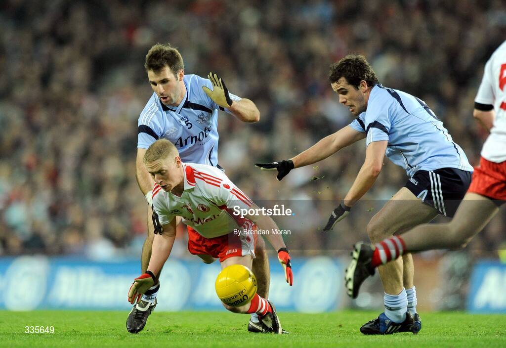 31 January 2009; Colm McCullagh, Tyrone, in action against Bryan Cullen, left, and Ger Brennan, Dublin. Allianz National Football League, Division 1, Round 1, Dublin v Tyrone, Croke Park, Dublin. Picture credit: Brendan Moran / SPORTSFILE