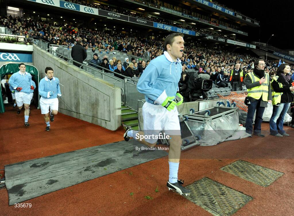 31 January 2009; Dublin's Conal Keaney runs out, while wearing a Dublin 'retro playing kit', onto the pitch before the start of the game. Allianz National Football League, Division 1, Round 1, Dublin v Tyrone, Croke Park, Dublin. Picture credit: Brendan Moran / SPORTSFILE