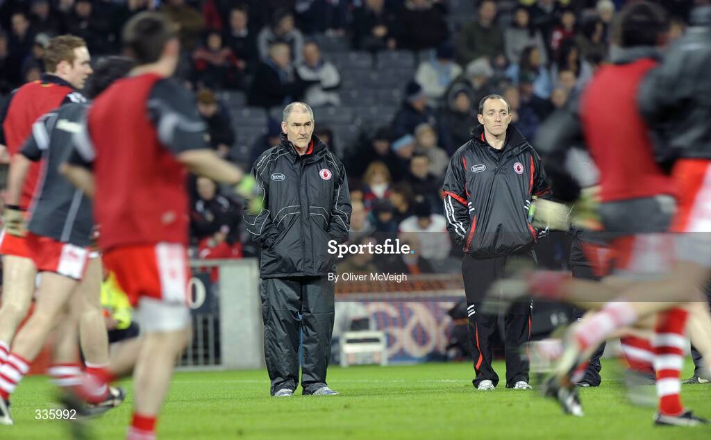 31 January 2009; Tyrone Manager Mickey Harte and Brian Dooher watch the players warm up before the game. Allianz National Football League, Division 1, Round 1, Dublin v Tyrone, Croke Park, Dublin. Picture credit: Oliver McVeigh / SPORTSFILE