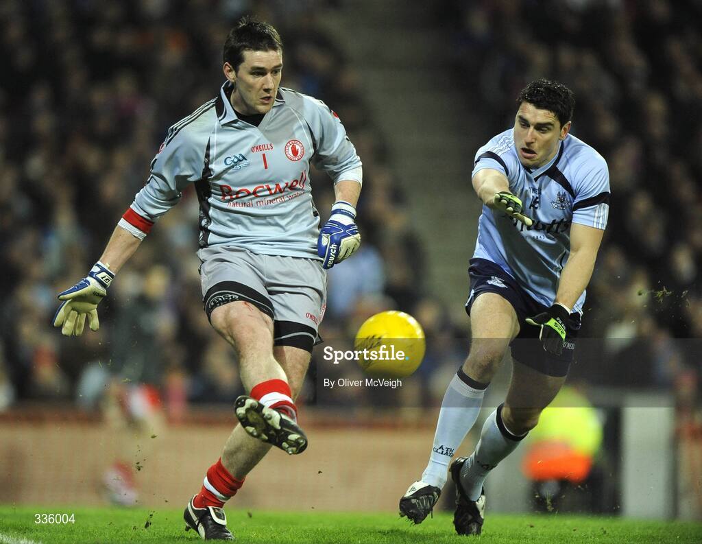 31 January 2009; Tyrone goalkeeper John Devine in action against Dublin's Bernard Brogan. Allianz National Football League, Division 1, Round 1, Dublin v Tyrone, Croke Park, Dublin. Picture credit: Oliver McVeigh / SPORTSFILE
