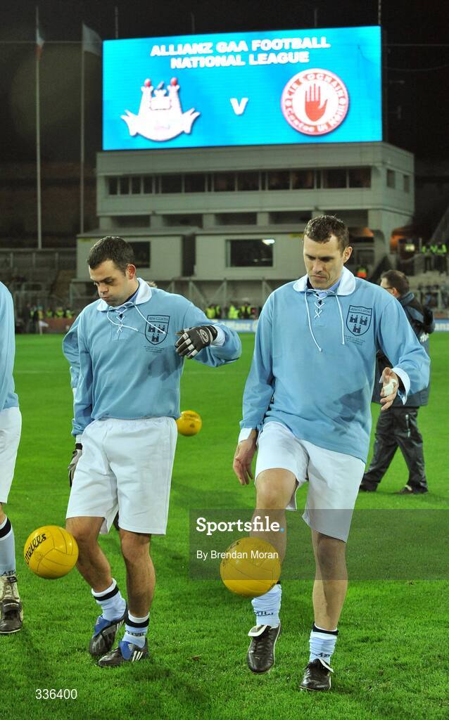 31 January 2009; Dublin players Paul Casey and Ciaran Whelan warm-up wearing 'retro playing kit' while waiting on the Tyrone team to come out onto the pitch. Allianz National Football League, Division 1, Round 1, Dublin v Tyrone, Croke Park, Dublin. Picture credit: Brendan Moran / SPORTSFILE