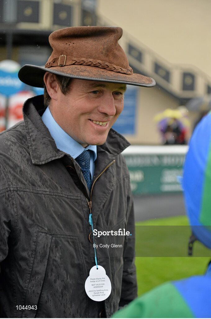 23 August 2015; Trainer Andrew Oliver talks to winning Jockey Chris Hayes in the parade ring after Plot Twist won the Longines Irish Champions Weekend Maiden. Horse Racing from the Curragh. Curragh, Co. Kildare. Picture credit: Cody Glenn / SPORTSFILE