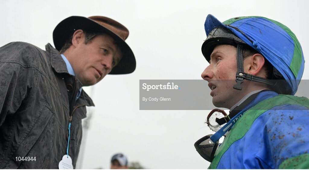 23 August 2015; Jockey Chris Hayes talks with Trainer Andrew Oliver after riding Plot Twist to victory in the Longines Irish Champions Weekend Maiden. Horse Racing from the Curragh. Curragh, Co. Kildare. Picture credit: Cody Glenn / SPORTSFILE