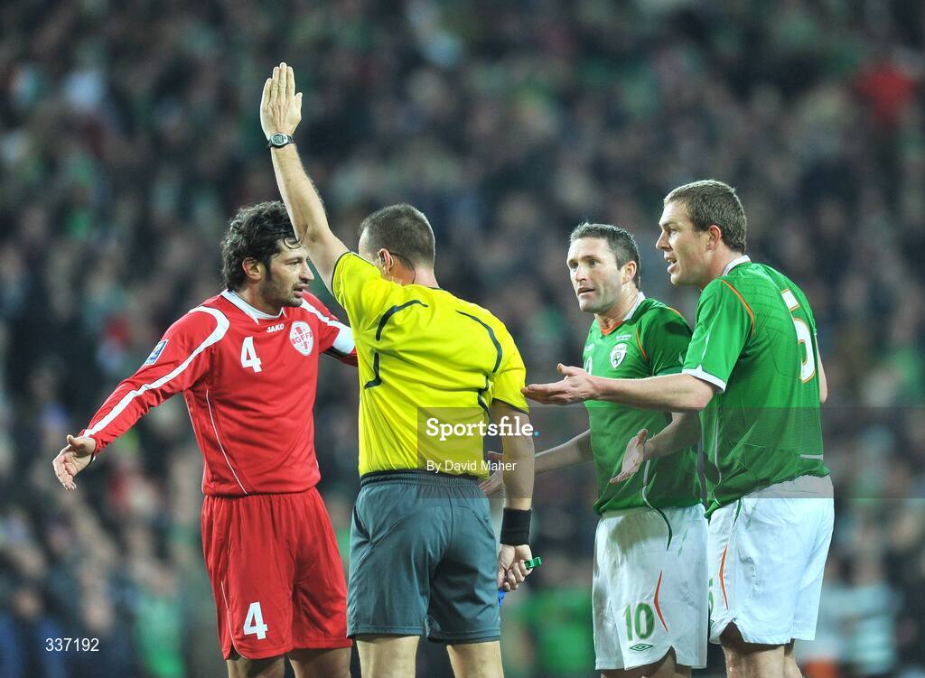 11 February 2009; Republic of Ireland's Robbie Keane and Richard Dunne remonstrate with referee Jouni Hyytia after he disallowed a Keith Andrews' goal for offside. 2010 FIFA World Cup Qualifier, Republic of Ireland v Georgia. Croke Park, Dublin. Picture credit: David Maher / SPORTSFILE