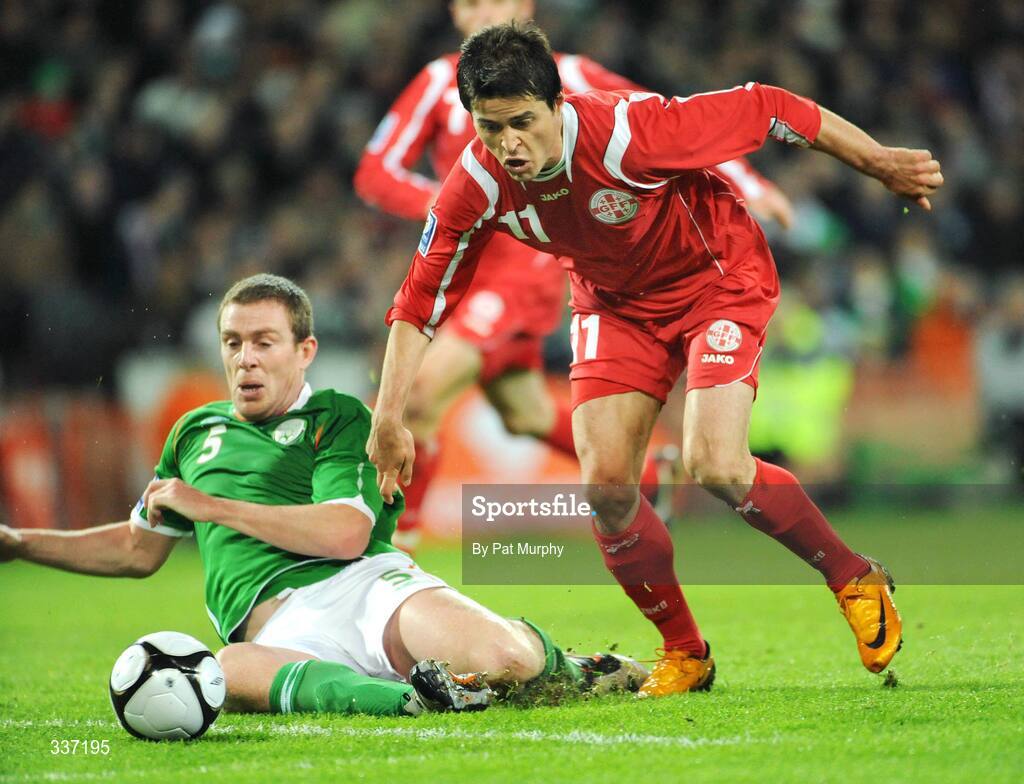 11 February 2009; David Siradz, Georgia, in action against Richard Dunne, Republic of Ireland. 2010 FIFA World Cup Qualifier, Republic of Ireland v Georgia. Croke Park, Dublin. Picture credit: Pat Murphy / SPORTSFILE
