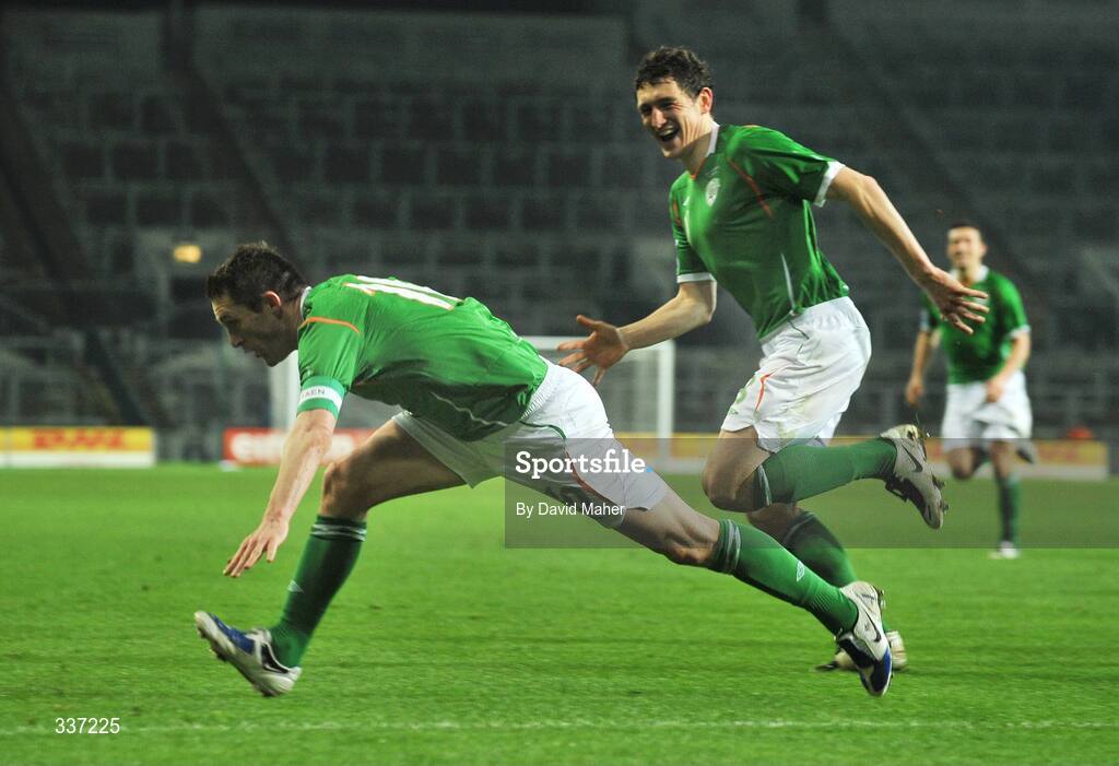11 February 2009; Republic of Ireland captain Robbie Keane celebrates after scoring his side's second goal with team-mate Keith Andrews. 2010 FIFA World Cup Qualifier, Republic of Ireland v Georgia. Croke Park, Dublin. Picture credit: David Maher / SPORTSFILE