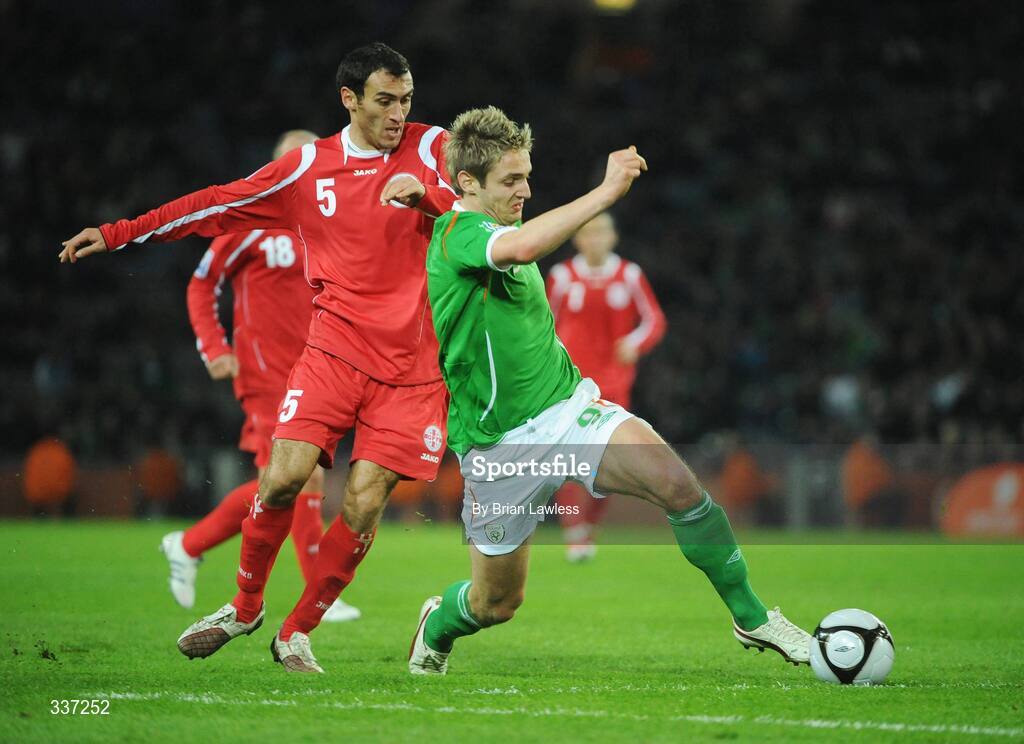 11 February 2009; Kevin Doyle, Republic of Ireland, in action against David Kvirkvelia, Georgia. 2010 FIFA World Cup Qualifier, Republic of Ireland v Georgia, Croke Park, Dublin. Picture credit: Brian Lawless / SPORTSFILE