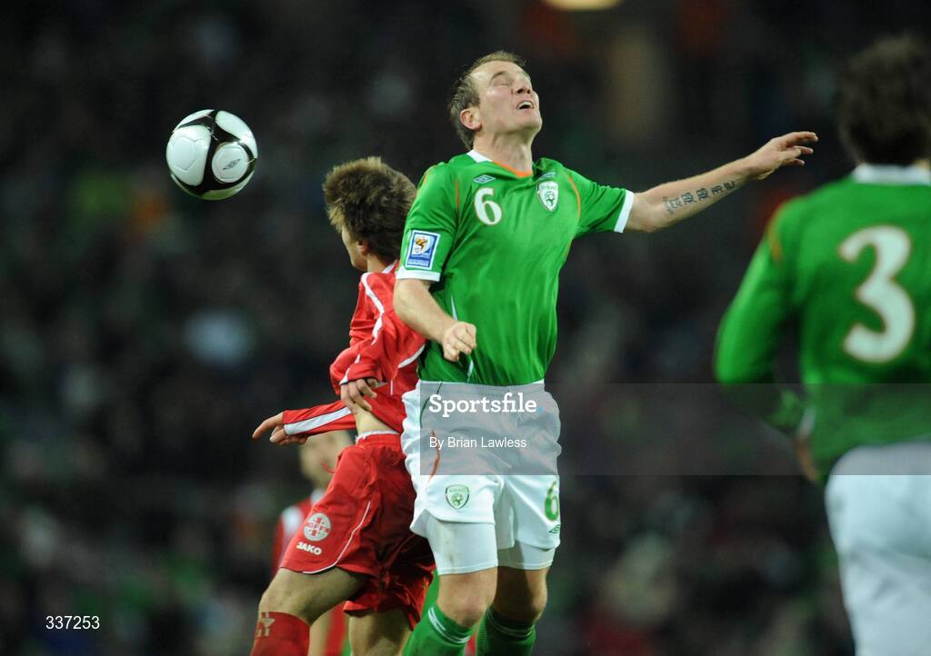 11 February 2009; Glenn Whelan, Republic of Ireland, in action against Beka Gotsiridze, Georgia. 2010 FIFA World Cup Qualifier, Republic of Ireland v Georgia, Croke Park, Dublin. Picture credit: Brian Lawless / SPORTSFILE