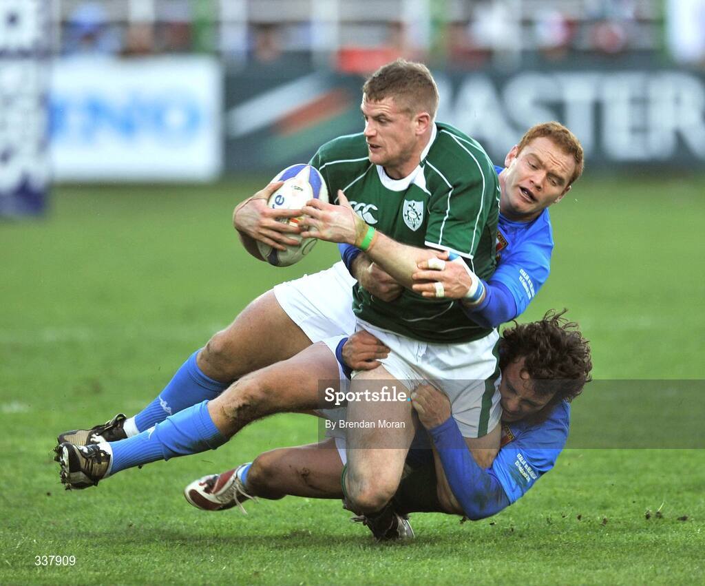 15 February 2009; Jamie Heaslip, Ireland, is tackled by Gonzalo Garcia and Paul Griffen, Italy. RBS Six Nations Championship, Italy v Ireland, Stadio Flaminio, Rome, Italy. Picture credit: Brendan Moran / SPORTSFILE