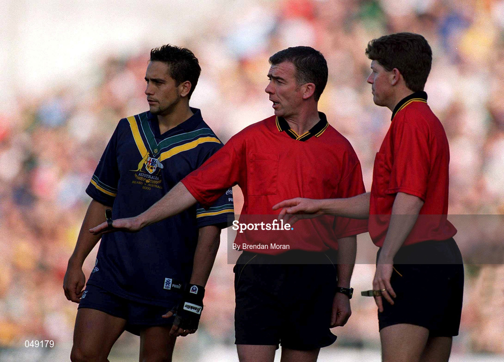 15 October 2000; Match official Pat McEneaney, centre, and Brett Allen, right, during the International Rules Series Second Test match between Ireland and Australia at Croke Park in Dublin. Photo by Brendan Moran/Sportsfile