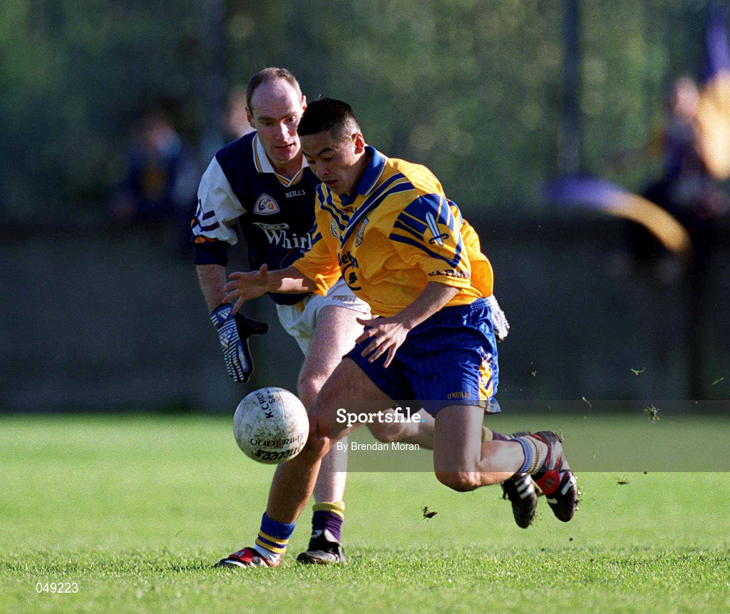 14 October 2000; Jason Sherlock of Na Fianna in action against John O'Donovan of Kilmacud Crokes during the Evening Herald Dublin Senior Football Championship Final match between Na Fianna and Kilmacud Crokes at Parnell Park in Dublin. Photo by Brendan Moran/Sportsfile