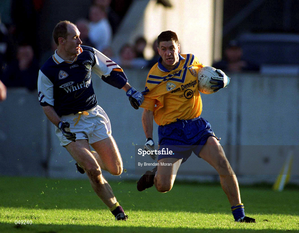 14 October 2000; Senan Connell of Na Fianna in action against John O'Donovan of Kilmacud Crokes during the Evening Herald Dublin Senior Football Championship Final match between Na Fianna and Kilmacud Crokes at Parnell Park in Dublin. Photo by Brendan Moran/Sportsfile