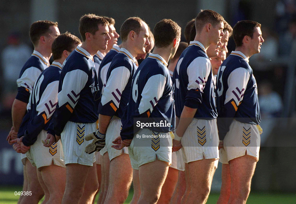 14 October 2000; Kilmacud Crokes team stand together for the national anthem prior to the Evening Herald Dublin Senior Football Championship Final match between Na Fianna and Kilmacud Crokes at Parnell Park in Dublin. Photo by Brendan Moran/Sportsfile