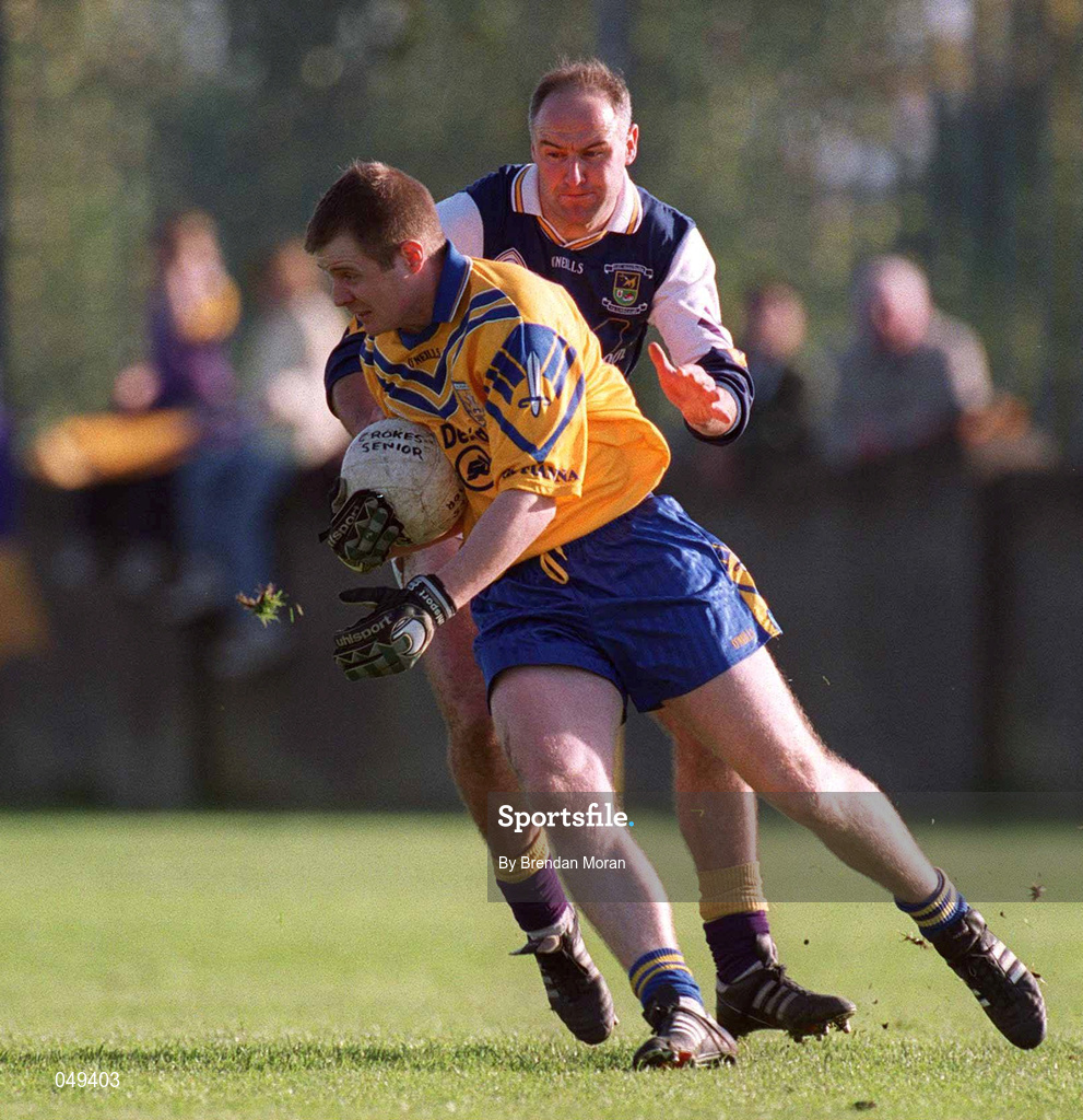 14 October 2000; Des Mackin of Na Fianna in action against Conor Deegan of Kilmacud Crokes during the Evening Herald Dublin Senior Football Championship Final match between Na Fianna and Kilmacud Crokes at Parnell Park in Dublin. Photo by Brendan Moran/Sportsfile