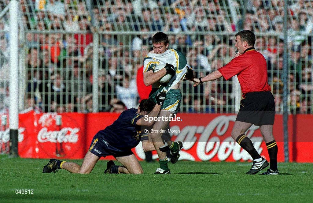 15 October 2000; Ciaran McManus of Ireland in action against Blake Caracella of Australia during the International Rules Series Second Test match between Ireland and Australia at Croke Park in Dublin. Photo by Brendan Moran/Sportsfile