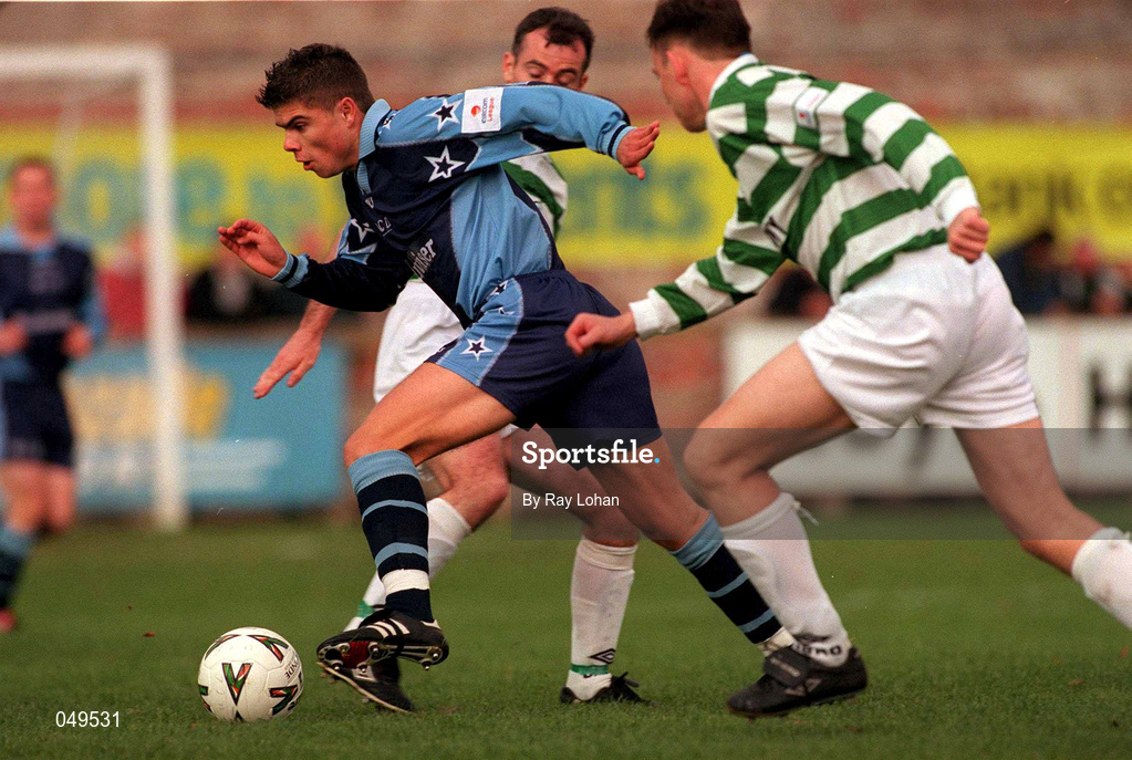 22 October 2000; Kevin Grogan of UCD in action against Terry Palmer of Shamrock Rovers during the Eircom League Premier Division match between UCD and Shamrock Rovers at Belfield Park in Dublin. Photo by Ray Lohan/Sportsfile