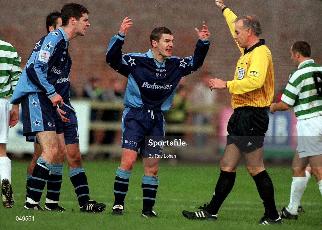 22 October 2000; Ciaran Kavanagh of UCD, centre, and Eamon McLaughlin, left, remonstrates with referee Hugh Byrne during the Eircom League Premier Division match between UCD and Shamrock Rovers at Belfield Park in Dublin. Photo by Ray Lohan/Sportsfile