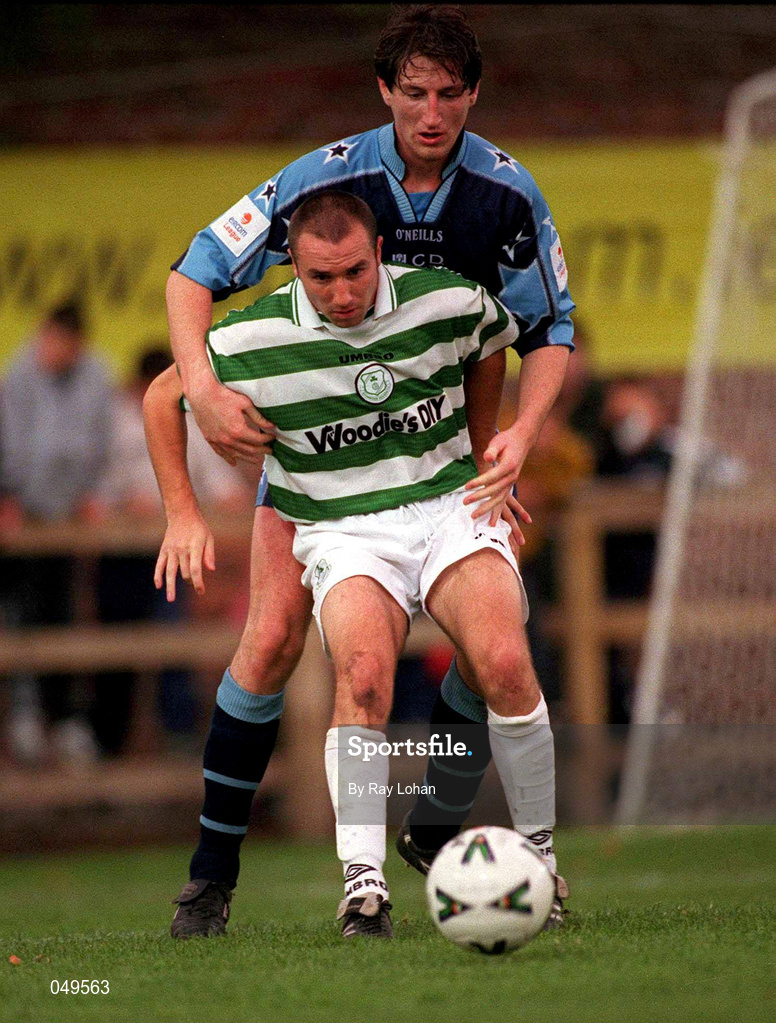 22 October 2000; Tony Grant of Shamrock Rovers in action against Clive Delaney of UCD during the Eircom League Premier Division match between UCD and Shamrock Rovers at Belfield Park in Dublin. Photo by Ray Lohan/Sportsfile