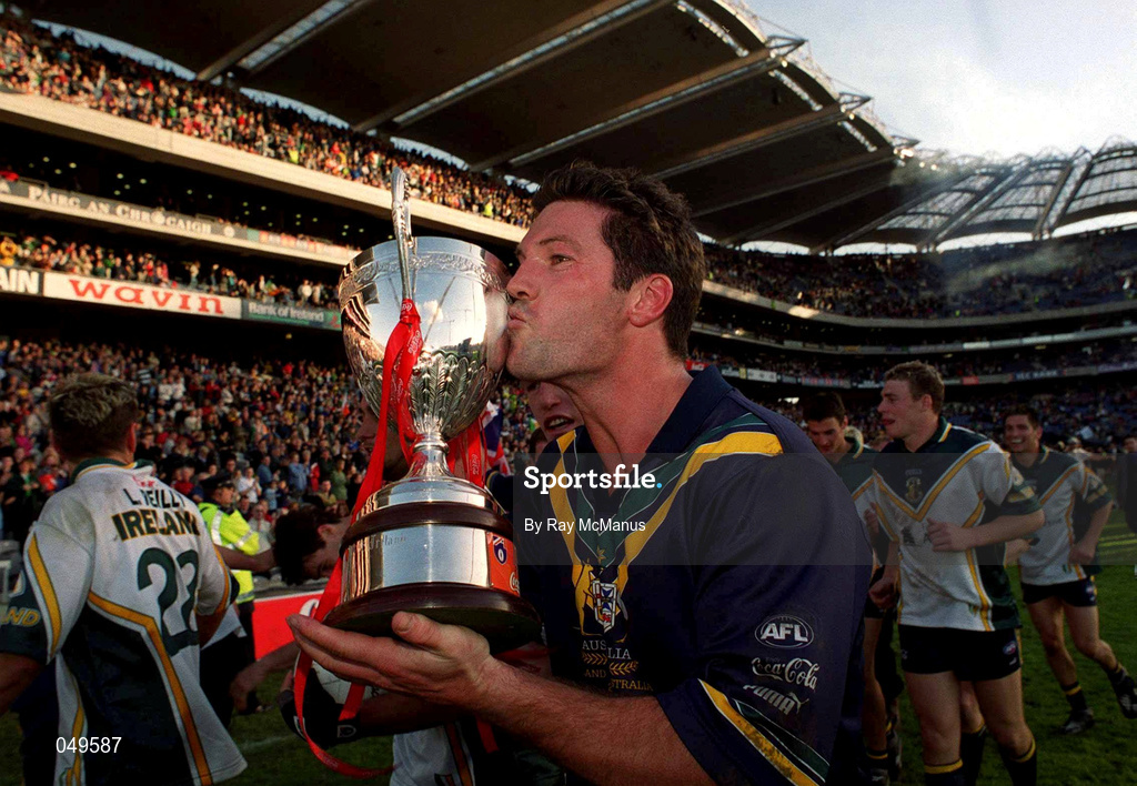 15 October 2000; Andrew Kellaway of Australia celebrates with the trophy following his side's victory during the International Rules Series Second Test match between Ireland and Australia at Croke Park in Dublin. Photo by Ray McManus/Sportsfile