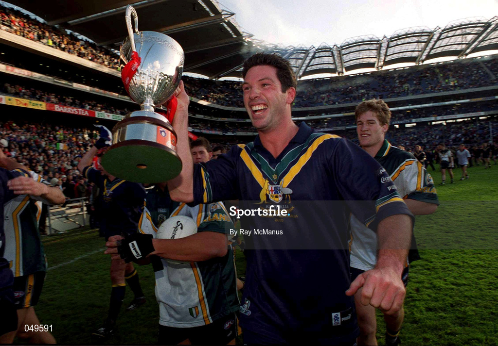 15 October 2000; Andrew Kellaway of Australia celebrates with the trophy following his side's victory during the International Rules Series Second Test match between Ireland and Australia at Croke Park in Dublin. Photo by Ray McManus/Sportsfile