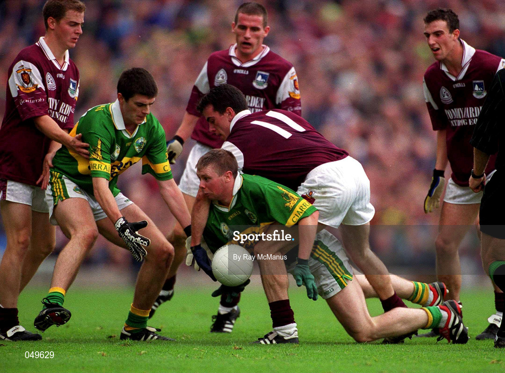 7 October 2000; Tomás Ó Sé of Kerry, supported by team-mate Aodan MacGearailt, left, in action against Padraic Joyce, centre, Michael Donnellan and Seán Óg De Paor of Galway during the Bank of Ireland All-Ireland Senior Football Championship Final Replay match between Kerry and Galway at Croke Park in Dublin. Photo by Ray McManus/Sportsfile