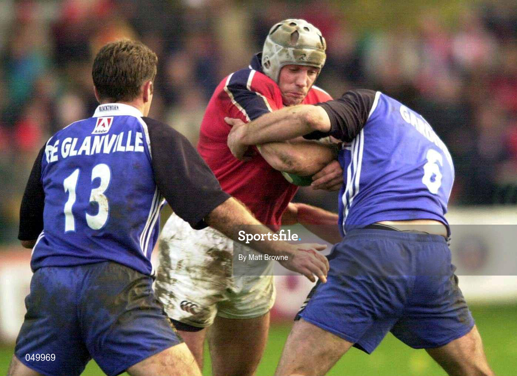 28 October 2000; Alan Quinlan of Munster is tackled by Angus Gardiner,r right, and Phil de Glanville of Bath during the Heineken European Cup Pool 4 Round 4 match between Bath and Munster at the Recreation Ground in Bath, England. Photo by Matt Browne/Sportsfile
