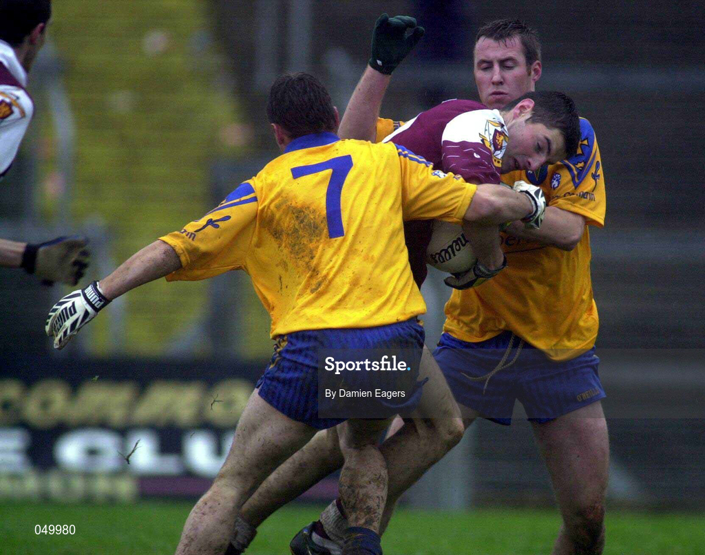 29 October 2000; Noel Meehan of Galway in action against Paul Noone, left, and Donal Casserly of Roscommon during the Church & General National Football League Division 1A match between Roscommon and Galway at Dr Hyde Park in Roscommon. Photo by Damien Eagers/Sportsfile