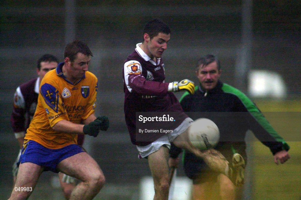 29 October 2000; Noel Meehan of Galway in action against Donal Casserly of Roscommon during the Church & General National Football League Division 1A match between Roscommon and Galway at Dr Hyde Park in Roscommon. Photo by Damien Eagers/Sportsfile