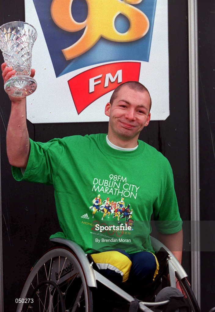 30 October 2000; Derek Connolly celebrates after winning the wheelchair 2000 98FM Dublin City Marathon in Dublin. Photo by Brendan Moran/Sportsfile