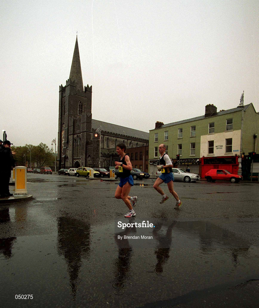 30 October 2000; A view of runners as they pass St Patrick's Cathedral during the 2000 98FM Dublin City Marathon in Dublin. Photo by Brendan Moran/Sportsfile