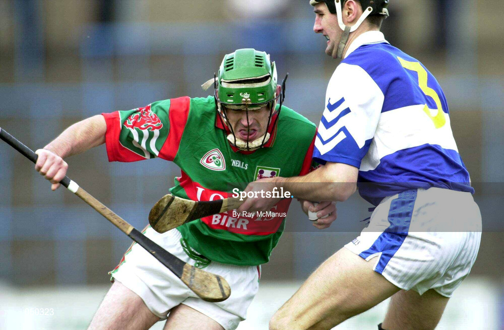 4 November 2000; Rory Hanniffy of Birr in action against Paul Cuddy of Castletown during the AIB Leinster Club Hurling Championship Quarter-Final match between Castletown and Birr at O'Moore Park in Portlaoise, Laois. Photo by Ray McManus/Sportsfile