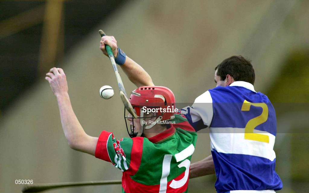 4 November 2000; Rory Hanniffy of Birr in action against Martin Phelan of Castletown during the AIB Leinster Club Hurling Championship Quarter-Final match between Castletown and Birr at O'Moore Park in Portlaoise, Laois. Photo by Ray McManus/Sportsfile