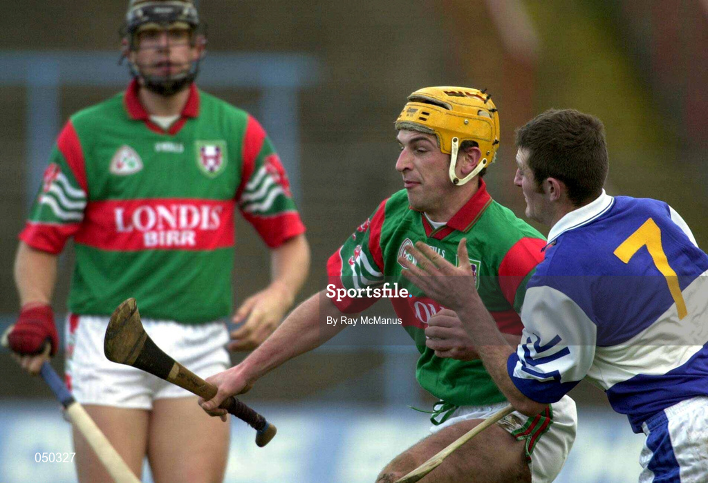 4 November 2000; Conor McGlone of Birr in action against John Palmer of Castletown during the AIB Leinster Club Hurling Championship Quarter-Final match between Castletown and Birr at O'Moore Park in Portlaoise, Laois. Photo by Ray McManus/Sportsfile