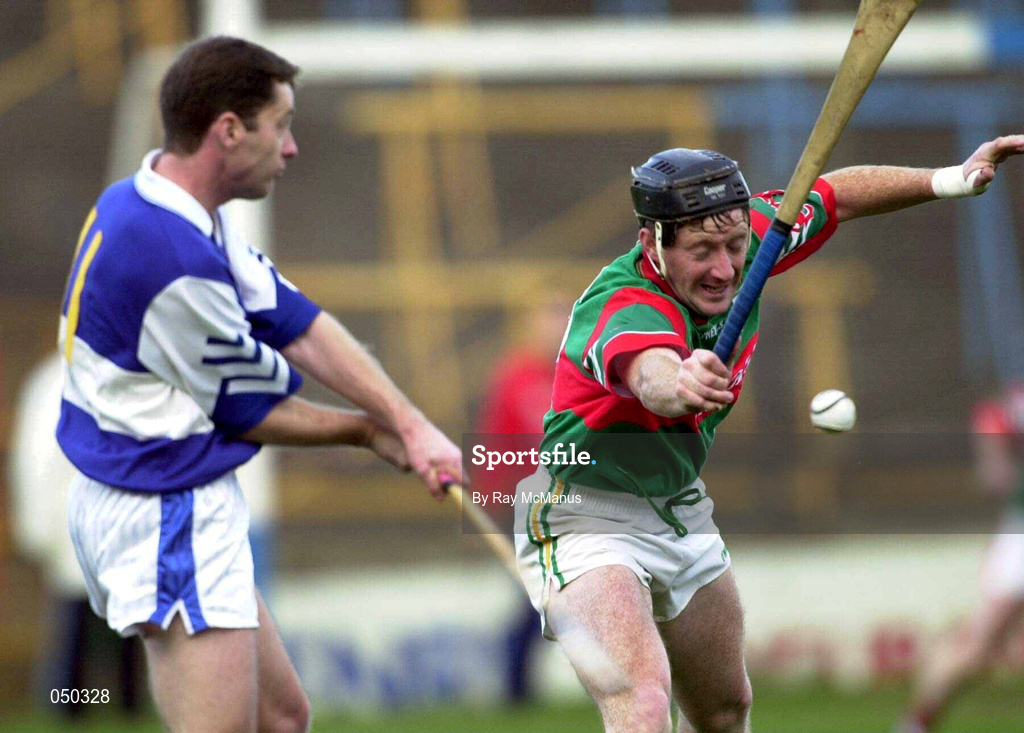 4 November 2000; John O'Sullivan of Castletown has his shot blocked by Brian Whelahan of Birr during the AIB Leinster Club Hurling Championship Quarter-Final match between Castletown and Birr at O'Moore Park in Portlaoise, Laois. Photo by Ray McManus/Sportsfile