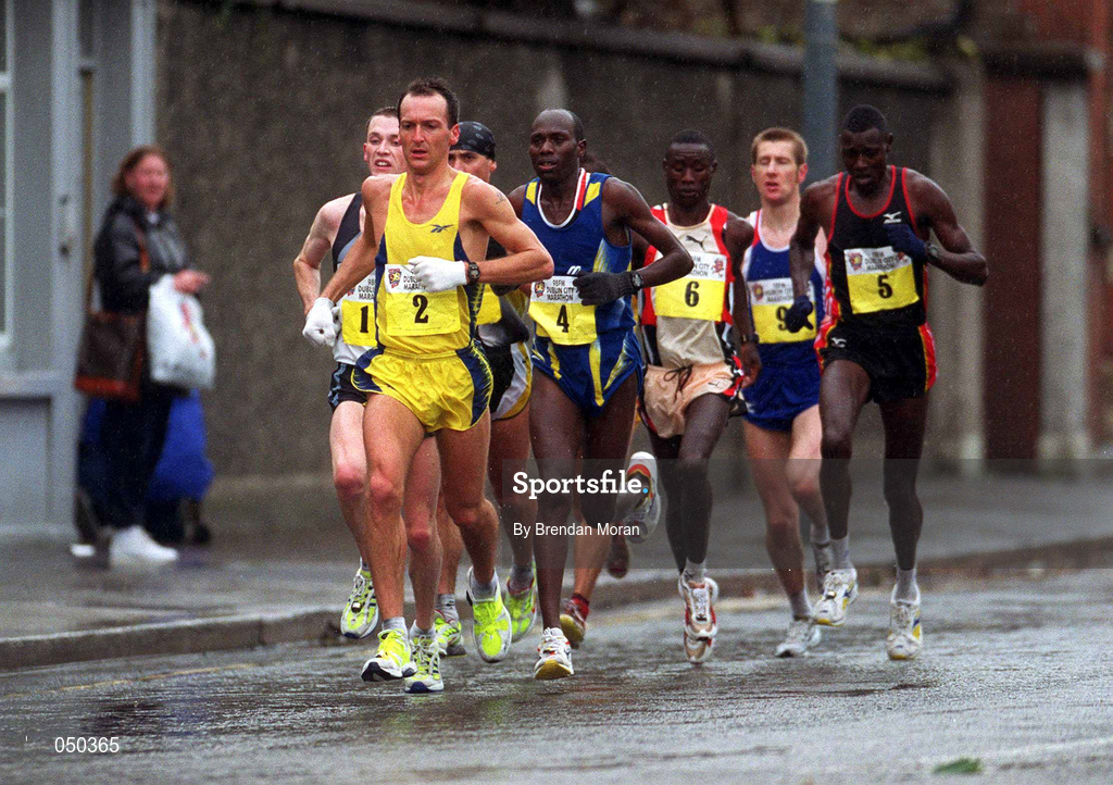 30 October 2000; Ireland's Jamie Lewis leads the front runners as they pass along Kevin Street during the 2000 98FM Dublin City Marathon in Dublin. Photo by Brendan Moran/Sportsfile