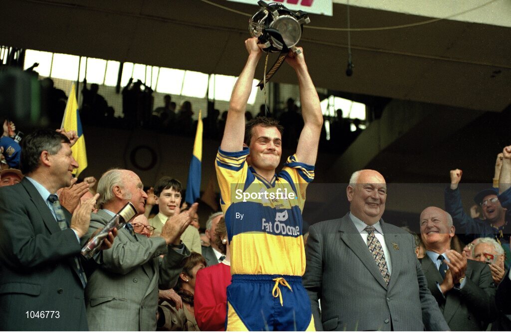 3 September 1995; Clare captain Anthony Daly lifts the Liam MacCarthy Cup alongside, from left, Liam Mulvihill, Director General of the GAA, The President of Ireland Patrick Hillery, and GAA President Jack Boothman. All-Ireland Hurling Final, Clare v Offaly, Croke Park, Dublin. Picture credit; SPORTSFILE