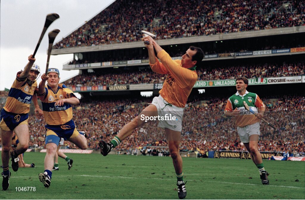 3 September 1995; Offaly goal keeper David Hughes in action against Clare players Ger O'Loughlin, left, and Éamonn Taaffe. Also pictured, Martin Hanamy, Offaly, right. All-Ireland Hurling Final, Clare v Offaly, Croke Park, Dublin. Picture credit; SPORTSFILE
