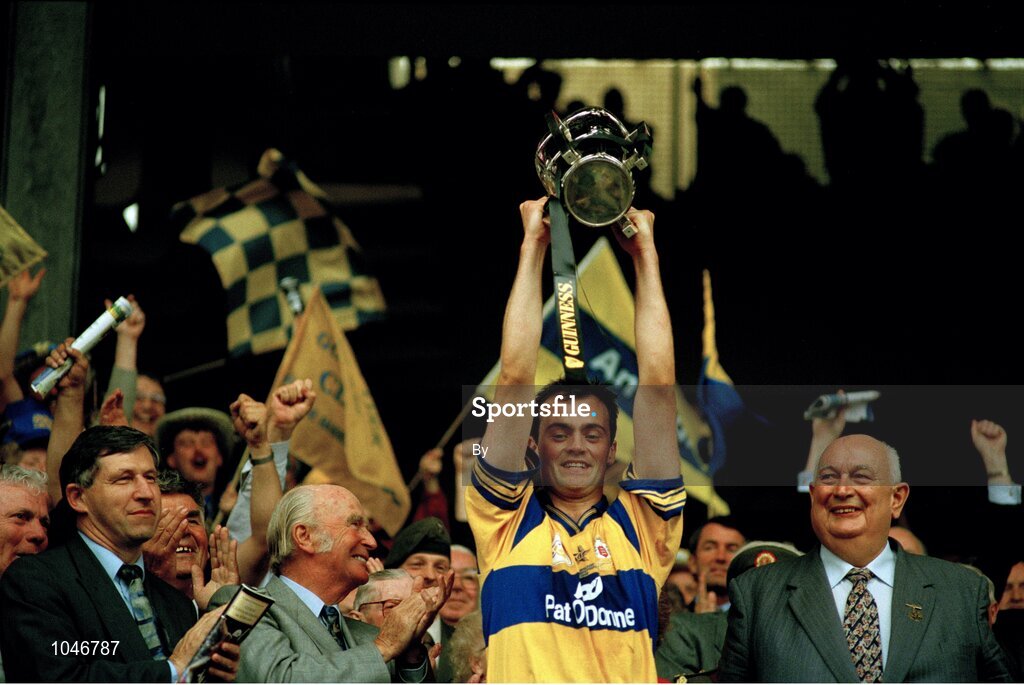 3 September 1995; Clare captain Anthony Daly lifts the Liam MacCarthy Cup alongside, from left, Liam Mulvihill, Director General of the GAA, The President of Ireland Patrick Hillery, and GAA President Jack Boothman. All-Ireland Hurling Final, Clare v Offaly, Croke Park, Dublin. Picture credit; SPORTSFILE