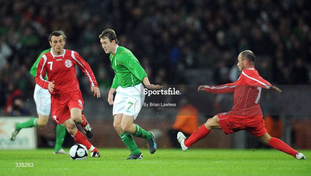 11 February 2009; Aiden McGeady, Republic of Ireland, in action against Luka Razmadze, left, and Zurab Menteshashvili, Georgia. 2010 FIFA World Cup Qualifier, Republic of Ireland v Georgia, Croke Park, Dublin. Picture credit: Brian Lawless / SPORTSFILE