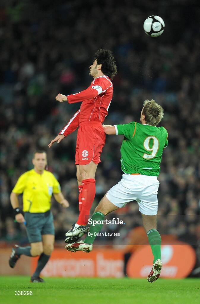 11 February 2009; Kakha Kaladze, Georgia, in action against Kevin Doyle, Republic of Ireland. 2010 FIFA World Cup Qualifier, Republic of Ireland v Georgia, Croke Park, Dublin. Picture credit: Brian Lawless / SPORTSFILE